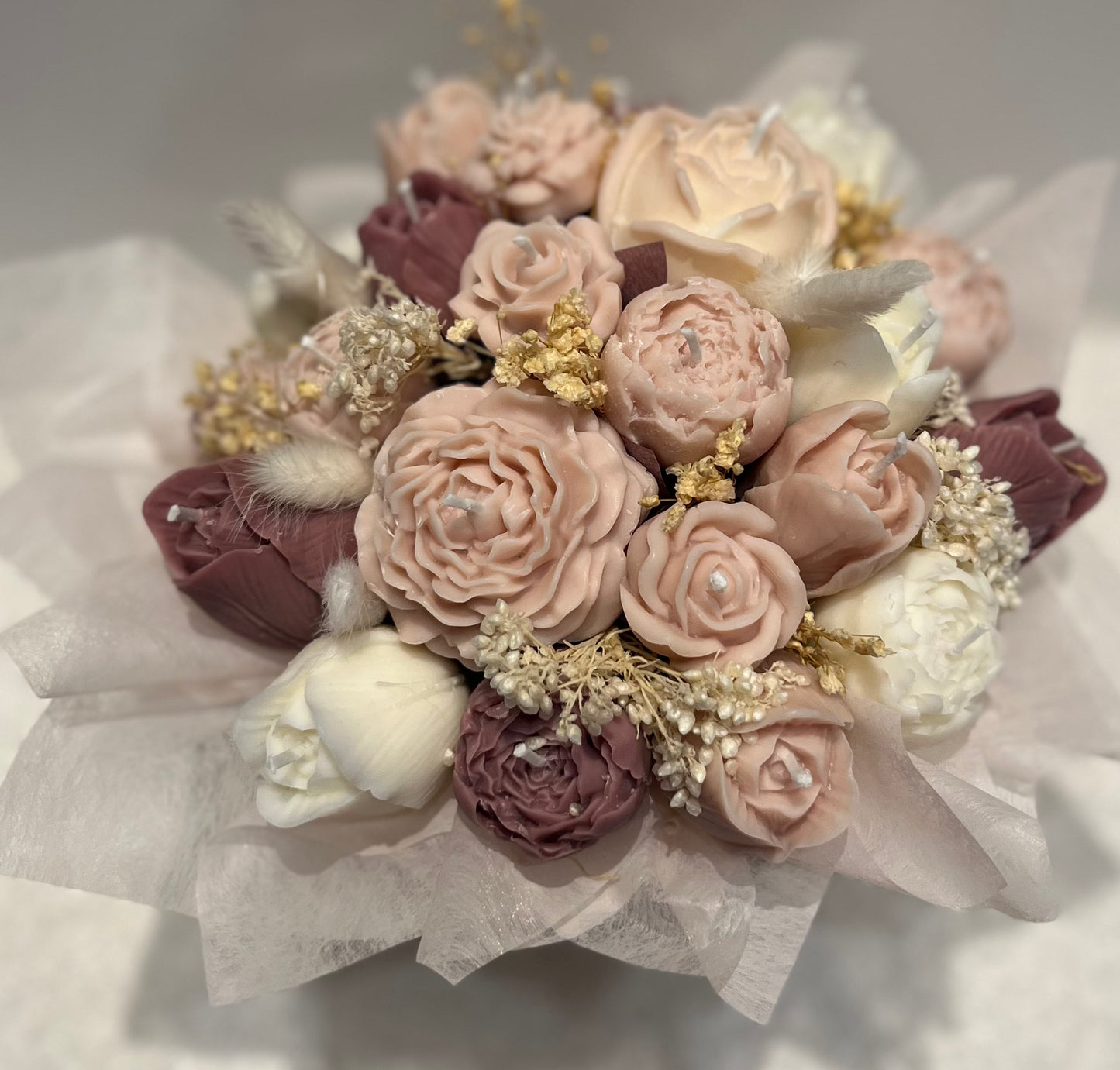 Bouquet of pastel-colored flowers on a white background