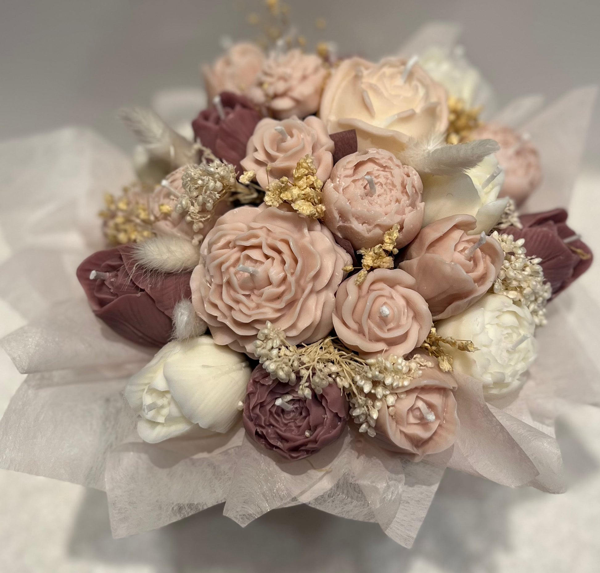 Bouquet of pastel-colored flowers on a white background